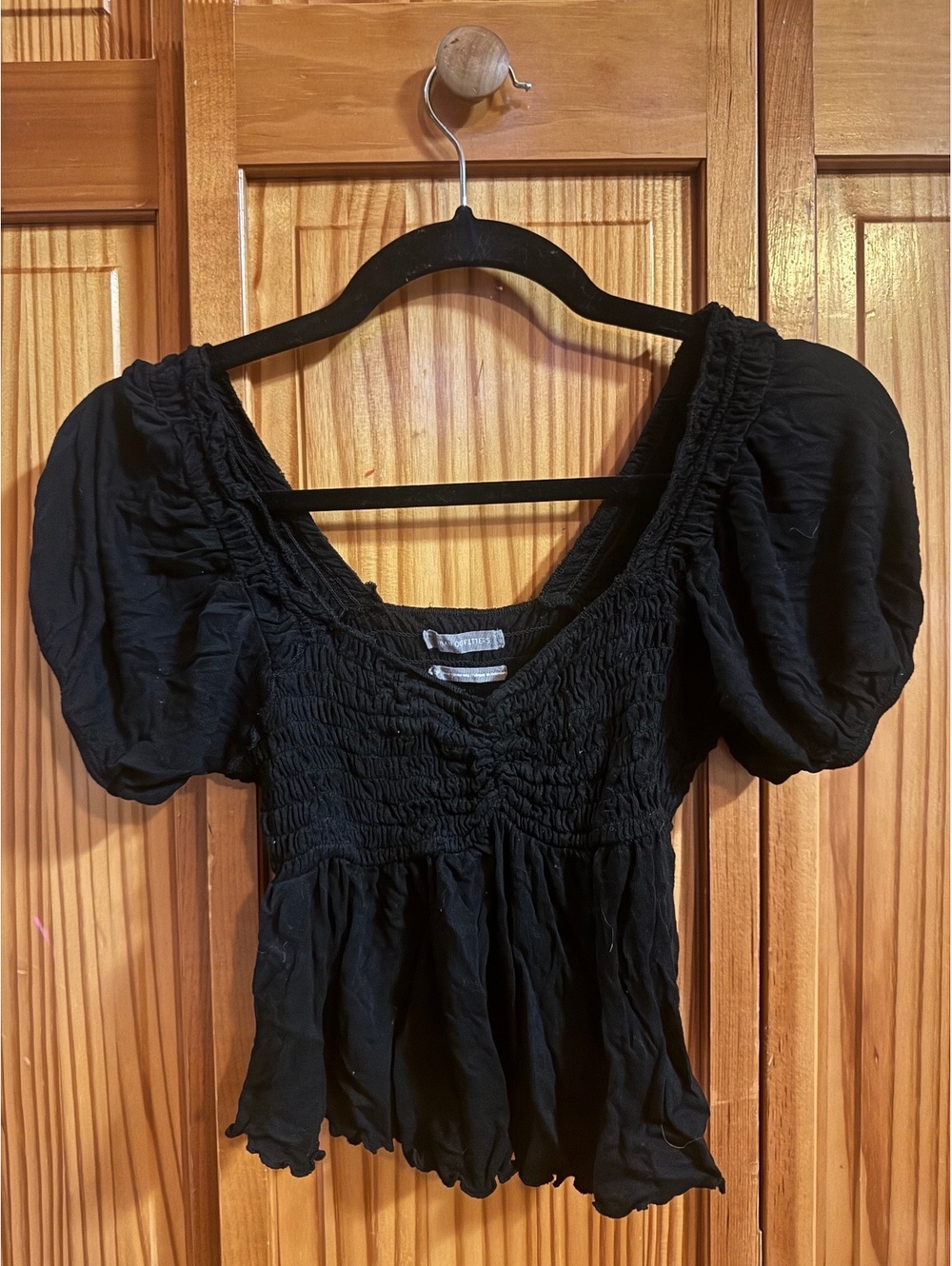 Black puff sleeve smocked top